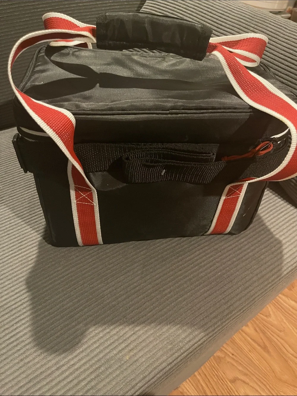 Igloo Black Duffel Cooler with Red and White Straps